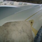Before and after photographs of a damaged white, AUDI Quattro SUV that was repaired by Elite Paint & Body Shop in West Palm Beach, Florida.